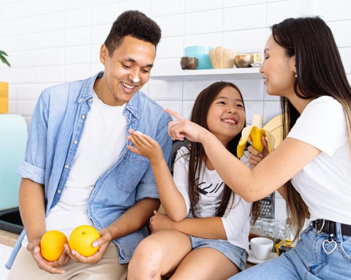 healthy family playing