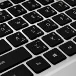 laptop keyboard writing