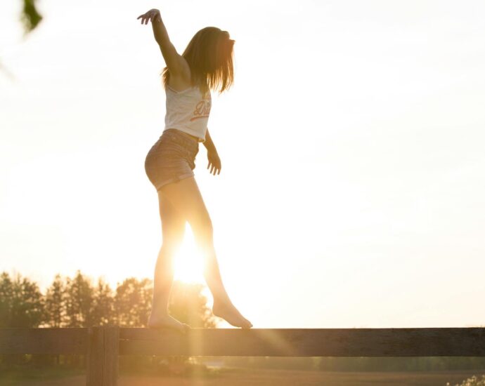 person balancing tech and nature