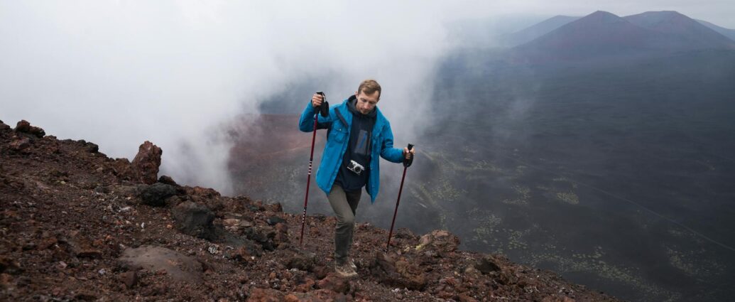 person hiking sustainable landscape