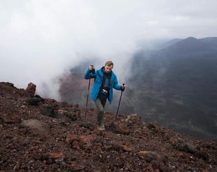 person hiking sustainable landscape