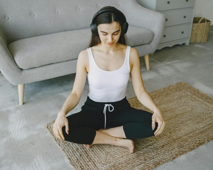 person meditating outdoors