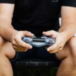 person playing mobile game