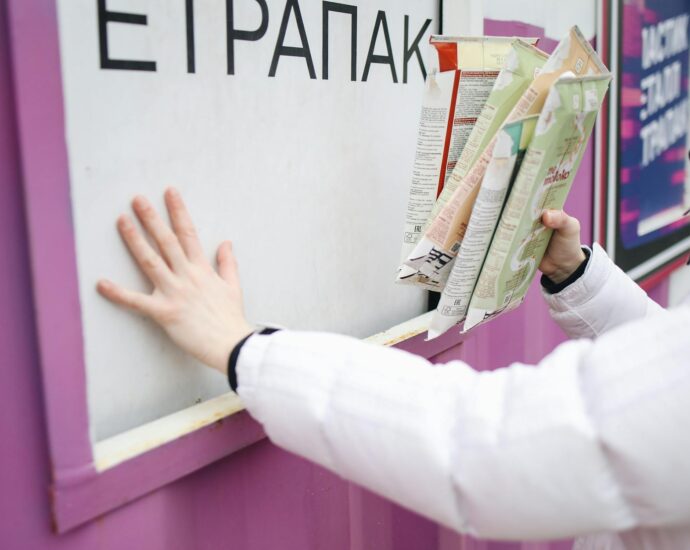 person recycling happy