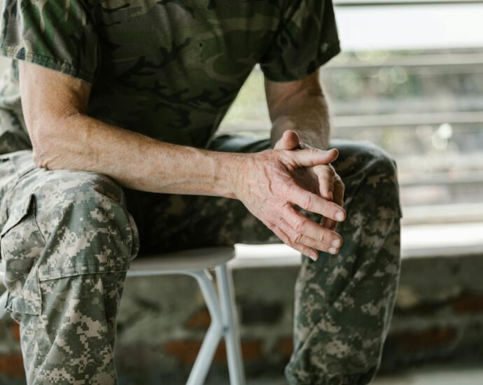 person using technology outdoors