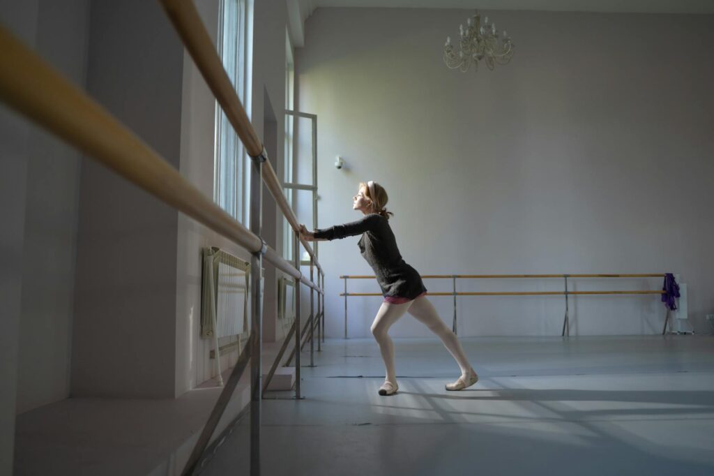 woman practicing yoga at home