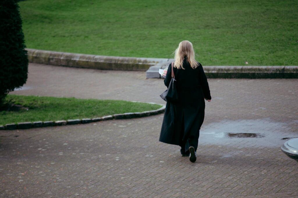 woman walking alone city