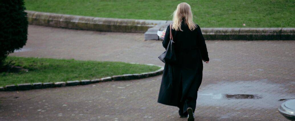 woman walking alone city
