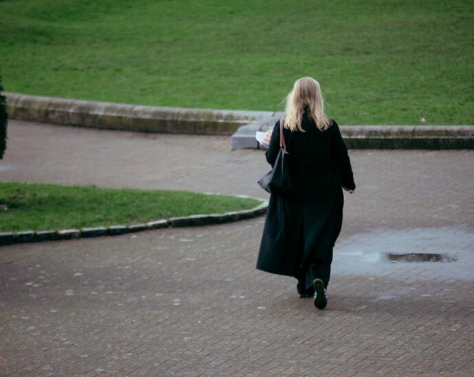 woman walking alone city
